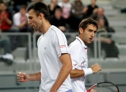 Marin Cilic and Ivo Karlovic won their doubles tennis match to seal a 3-0 win over Ecuador